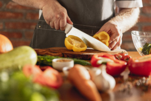 hands chef cutting vegetables his kitchen 300x200 - Sustainability Strategies in F&B Industry